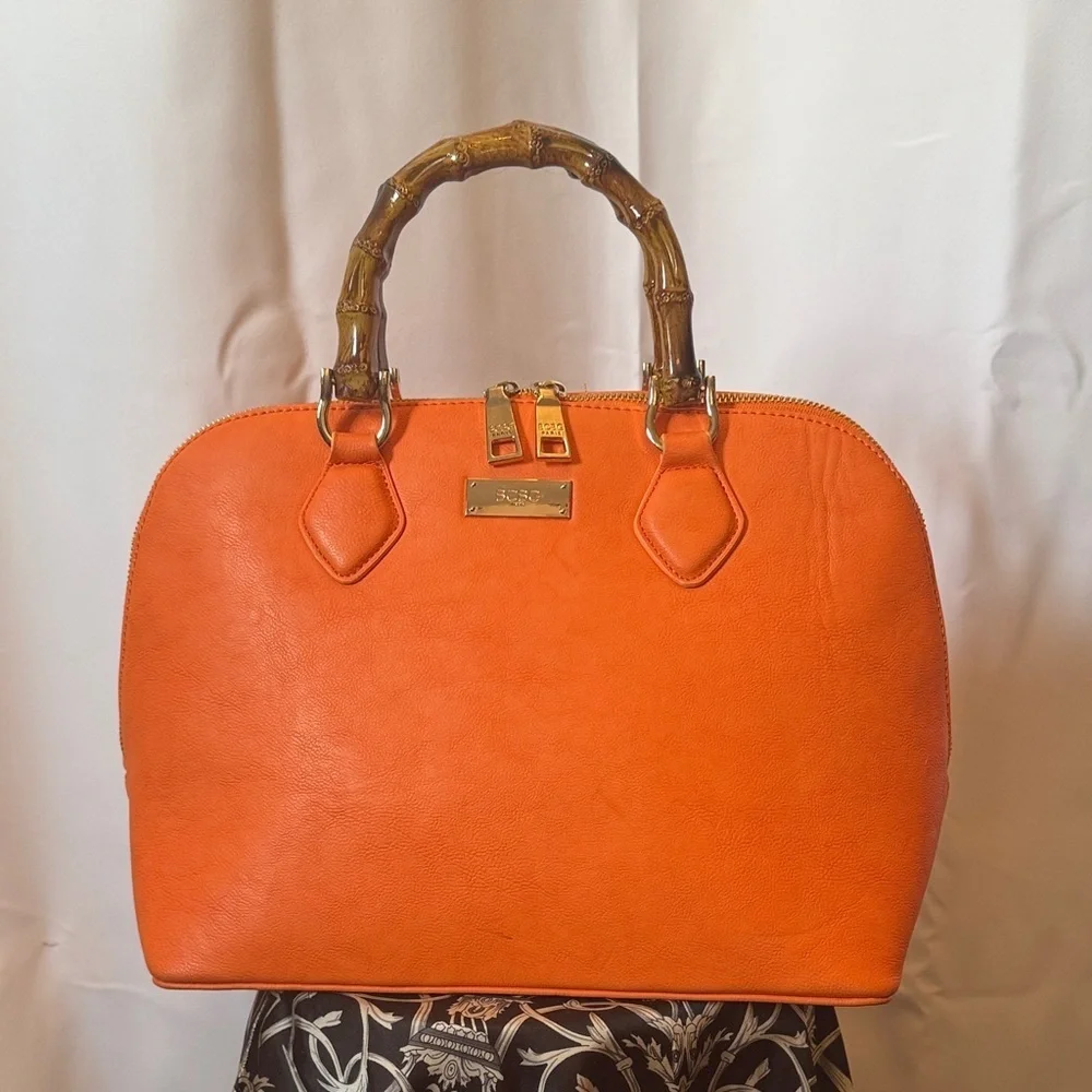 BCBG Paris Vibrant Orange bowling bag purse with Bamboo Accents y2k